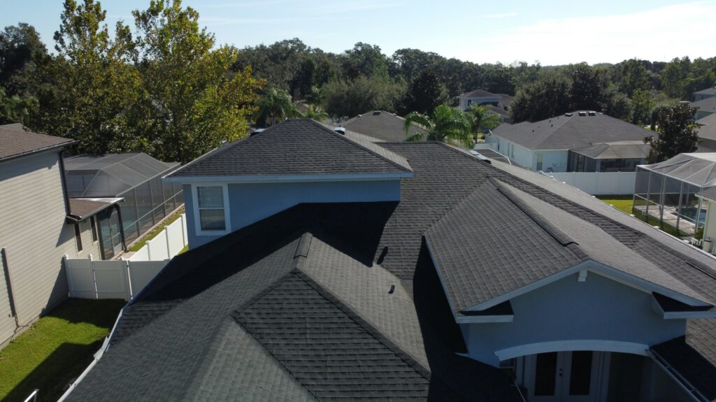 Residential houses with black GAF asphalt shingle roofing