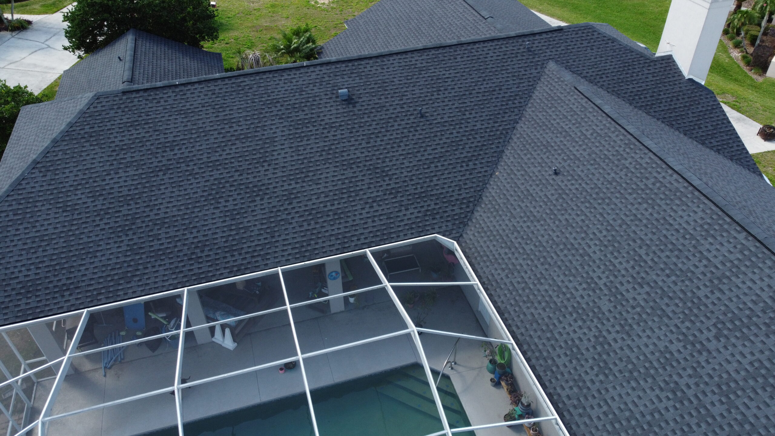 Newly replaced shingle roof in color black